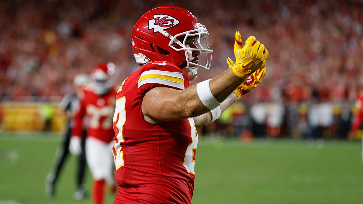 Travis Kelce celebrates after scoring during an NFL game against the Indianapolis Colts in Kansas City.