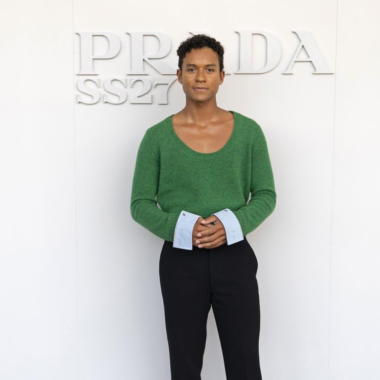 Jaafar Jackson wears a green knit top and tailored black trousers at the Prada spring/summer 2027 menswear show in Milan on June 21. Photo: Getty Images