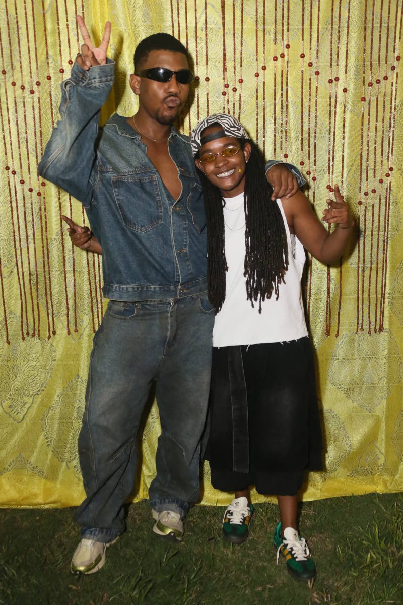 Podcaster and content creator Rushane ‘RushCam’ Campbell (left) was decked out in full denim as he playfully posed next to reggae artiste Koffee.